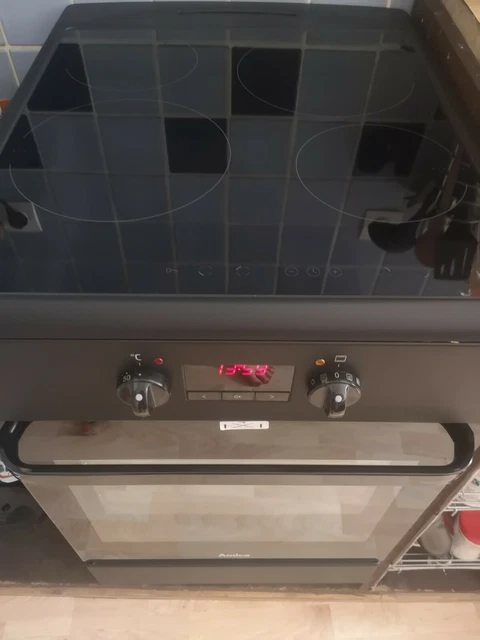 Cuisinière induction presque neuve  AMICA ACI605N (4 feux)