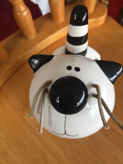 ceramic cat money box with string whiskers black/white 5'' x 3''bird on a wire