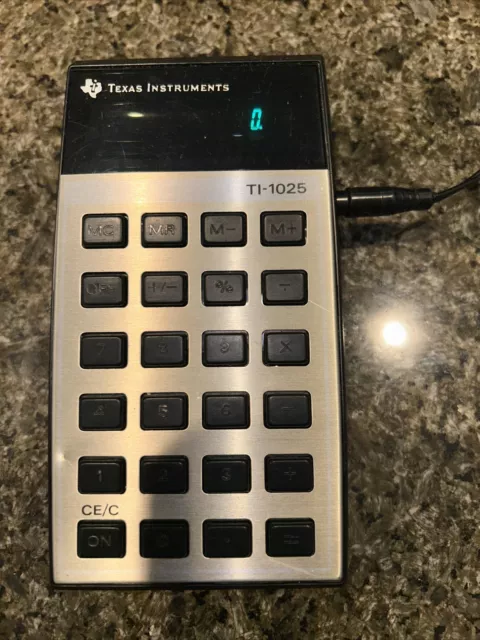 USED Texas Instruments TI-1025 Calculator Blue green VFD Display 1978 working